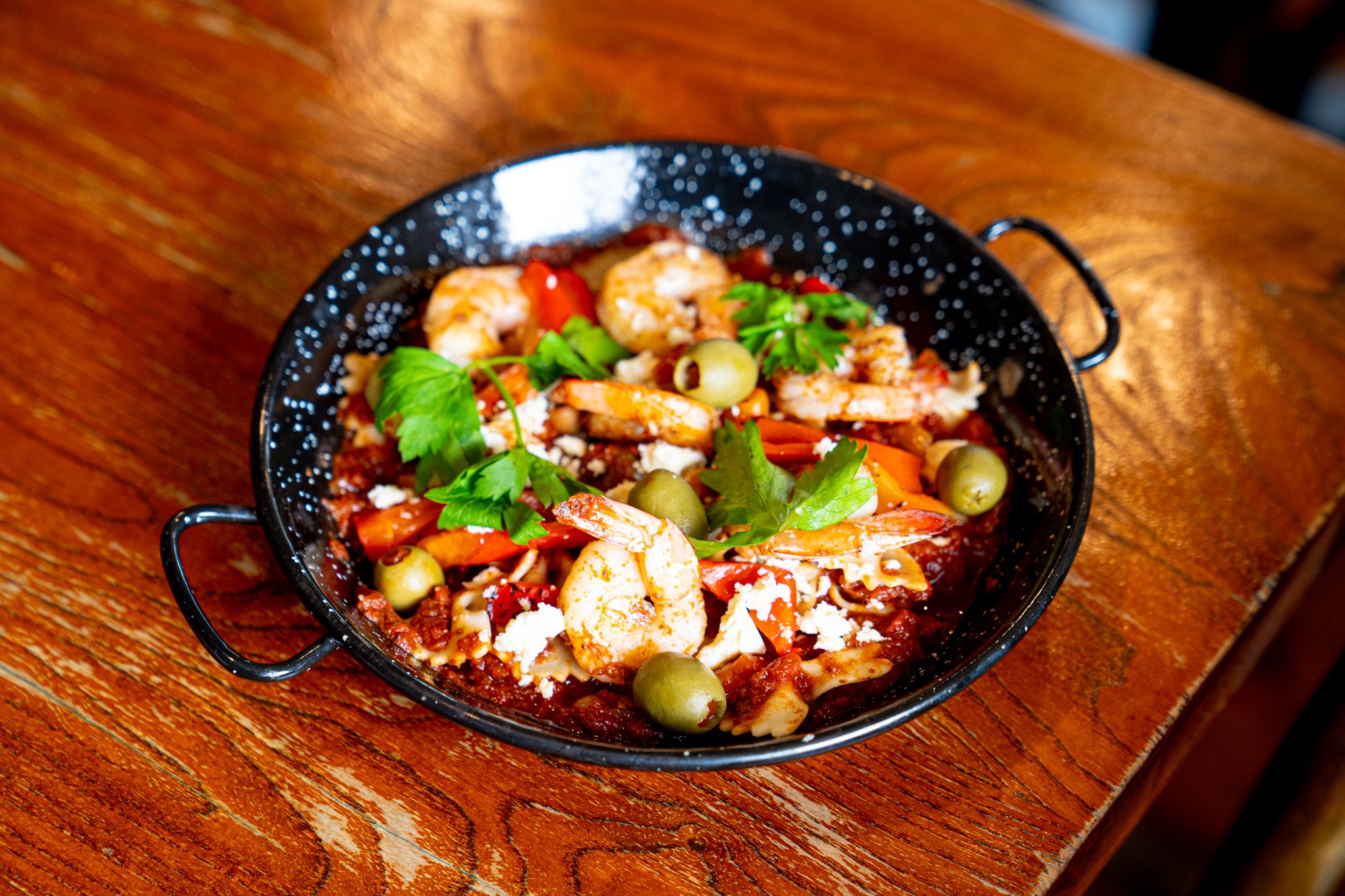 Shakshuka styled prawns w feta, olives & penne